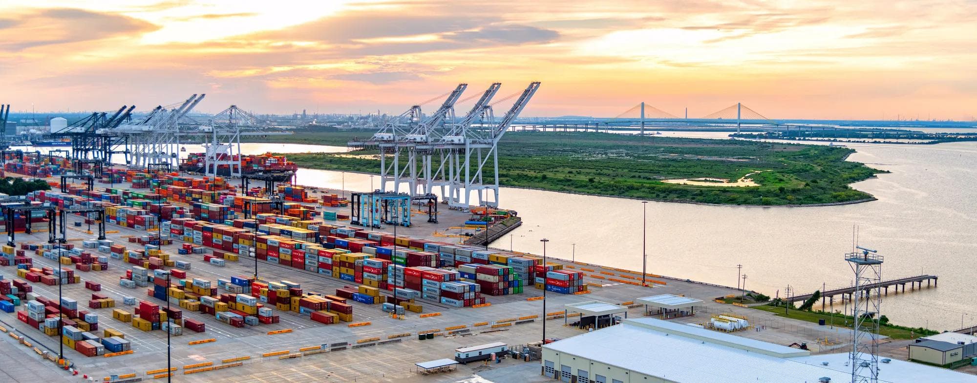 A large container ship being unloaded at the port of Houston, Texas, Morgan's Point