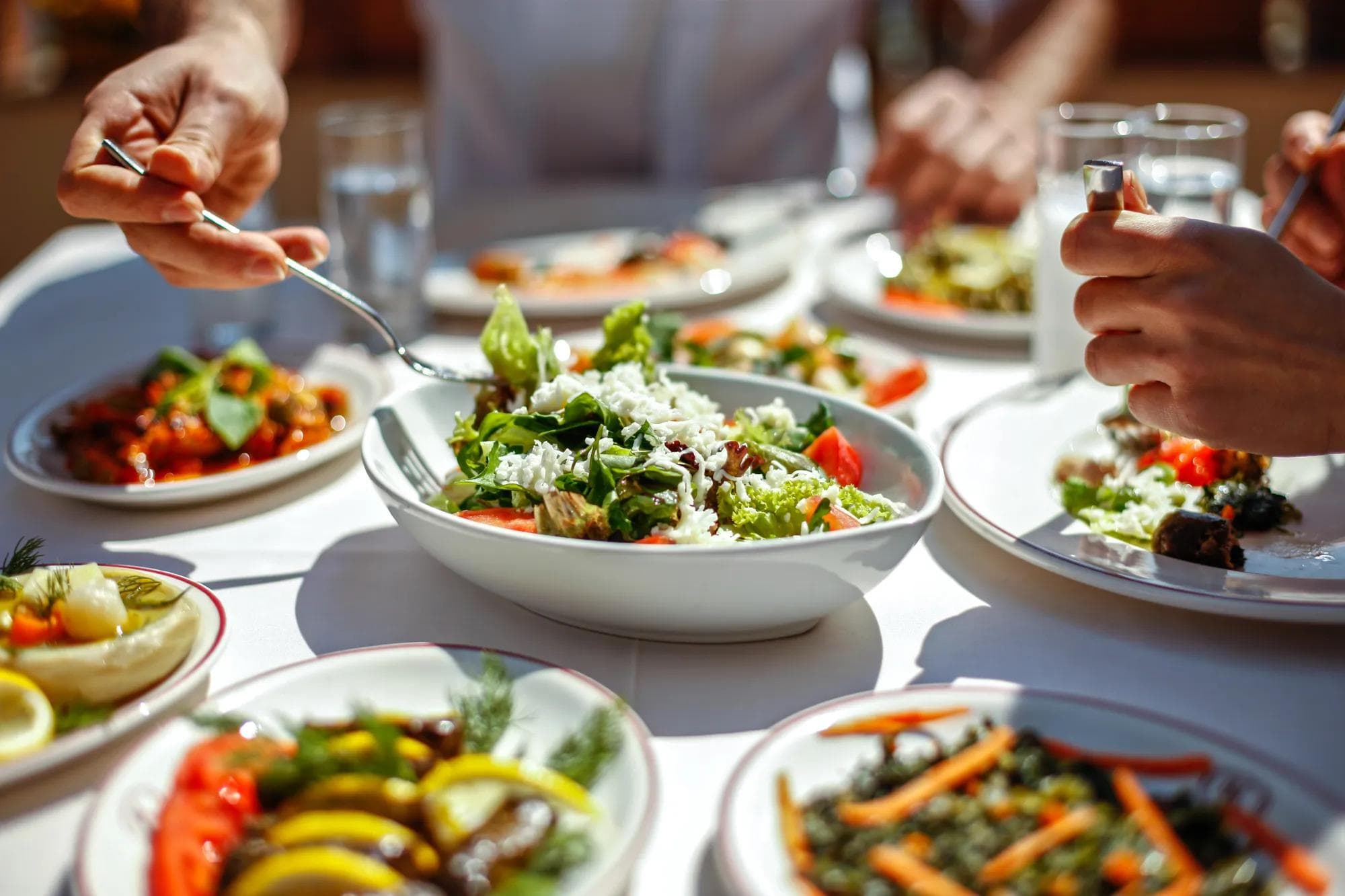 Couple Eating Lunch with Fresh Salad