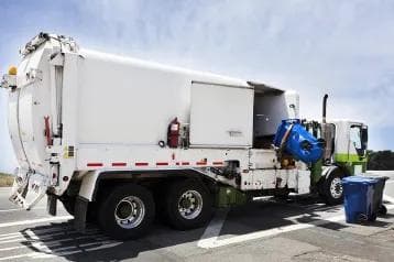 White refuse truck 