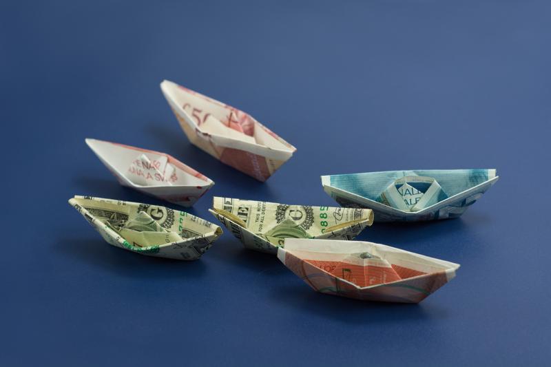 Boats made out of dollar bills. 