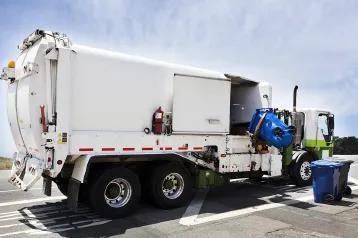 White refuse truck 