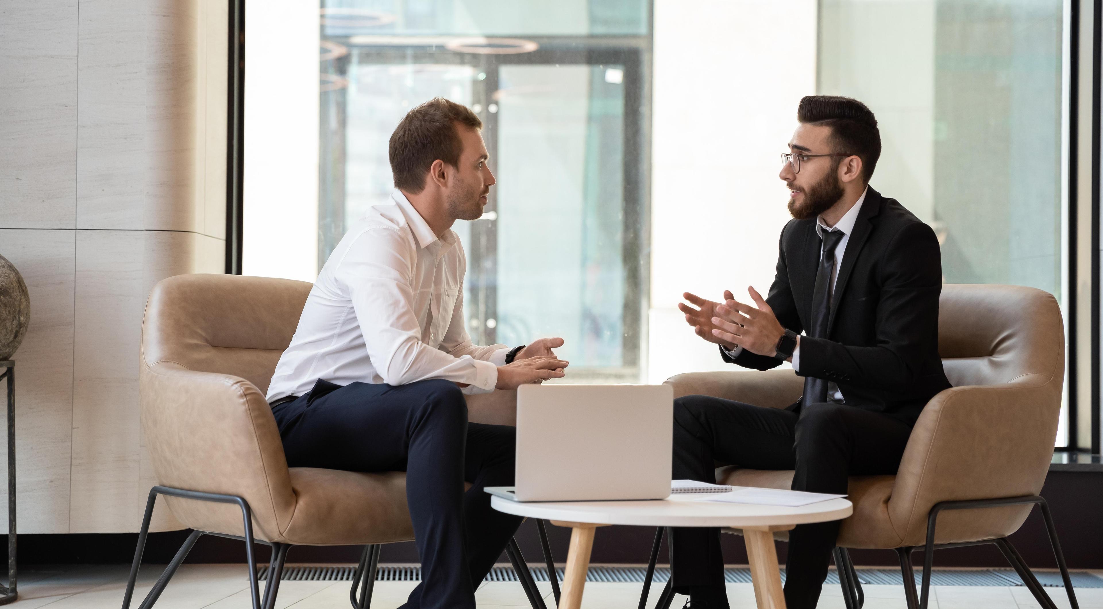 Two bankers in a discussion