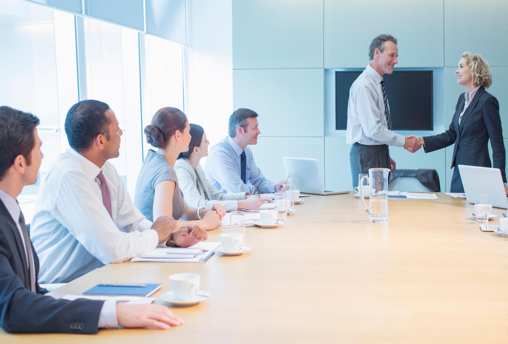 Business deal close with handshake