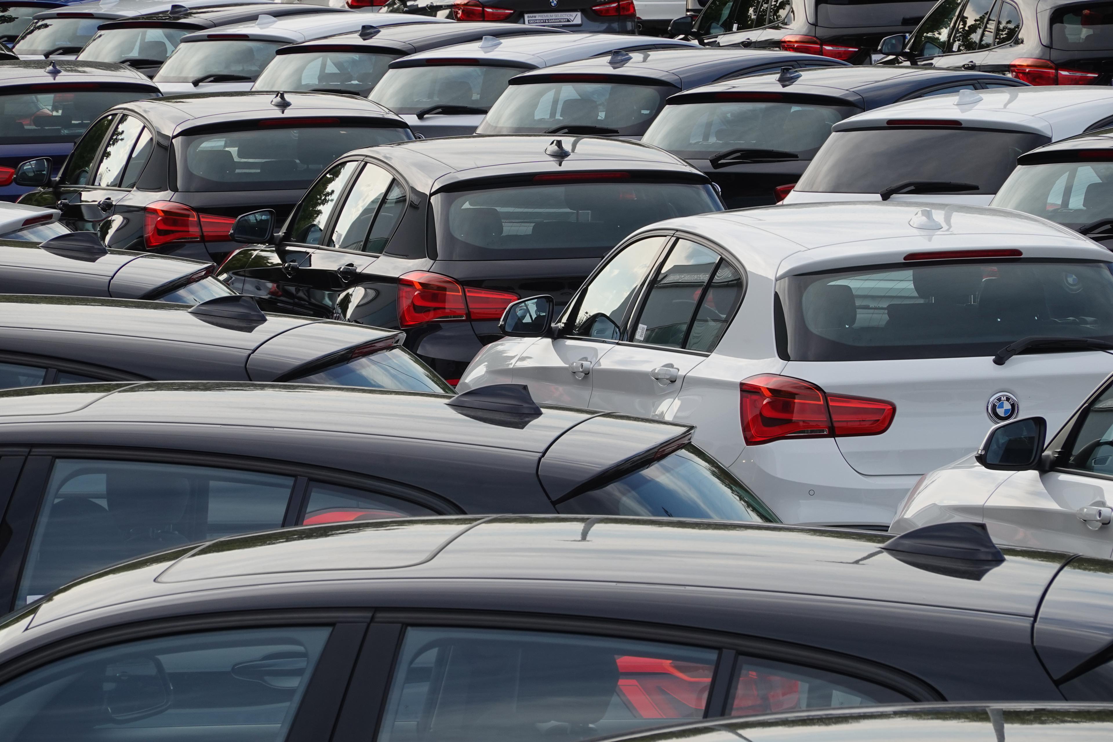 A row of BMW cars parked