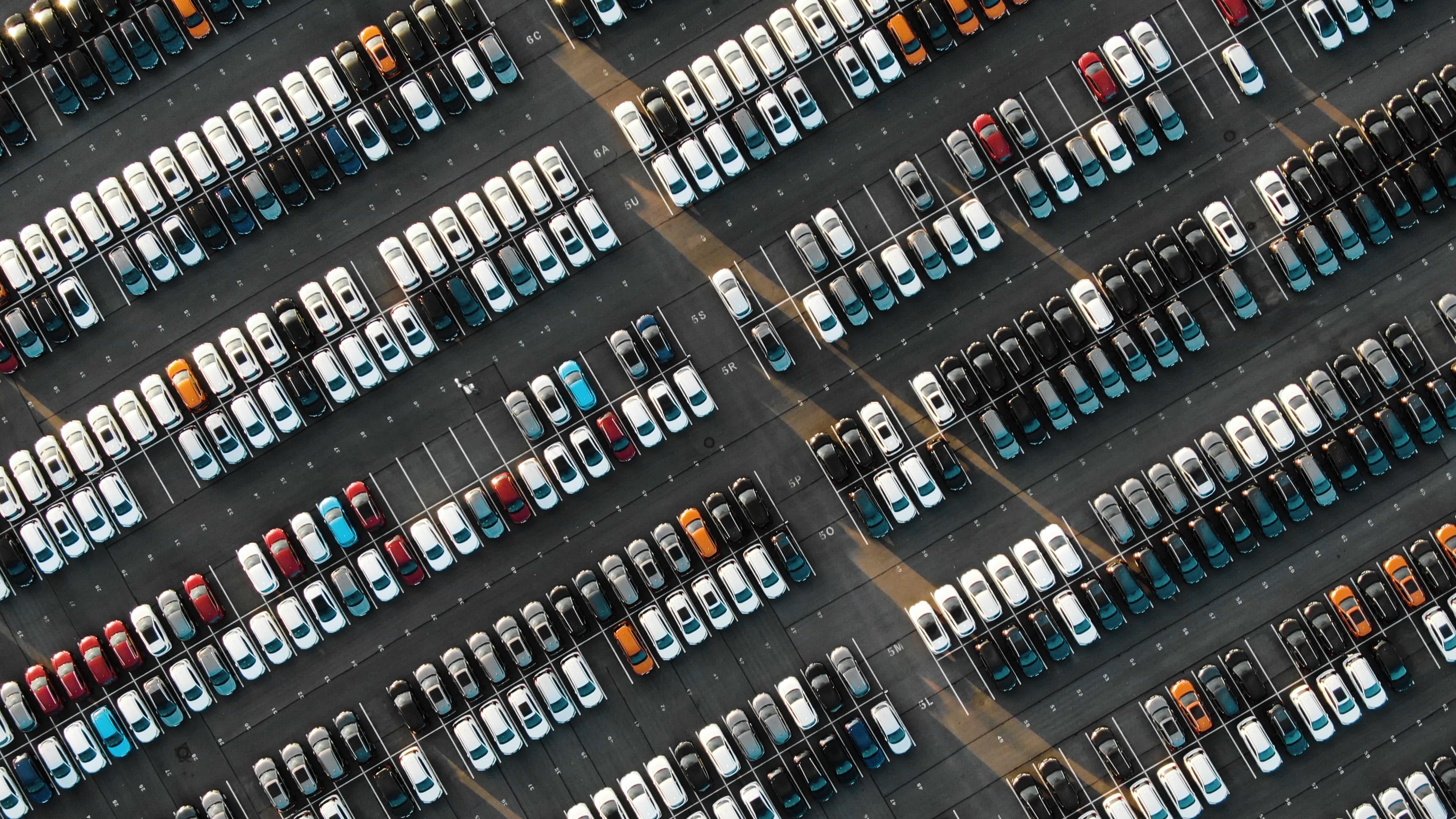 Parked new cars at the car building