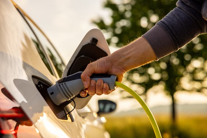 Man charging EV