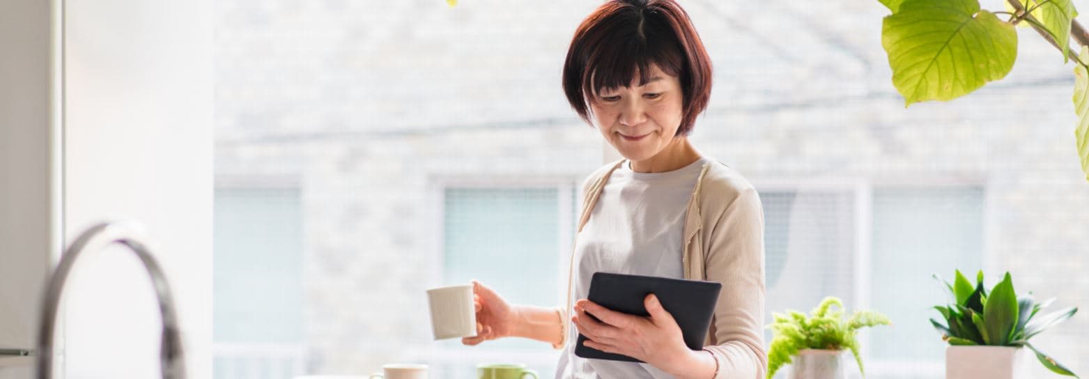 Women reading iPad