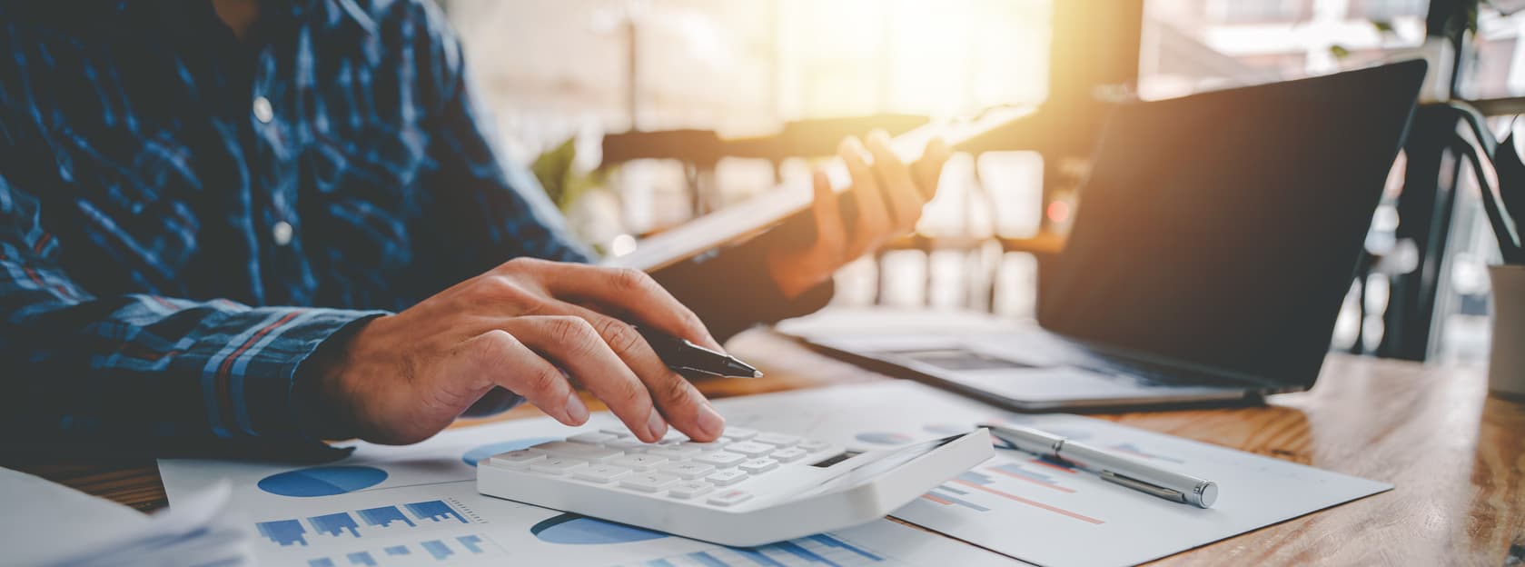 Person calculating financials