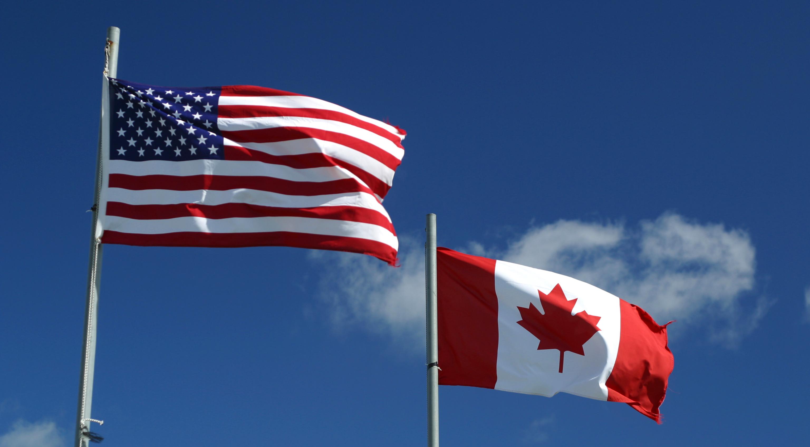 US and Canadian Flags.