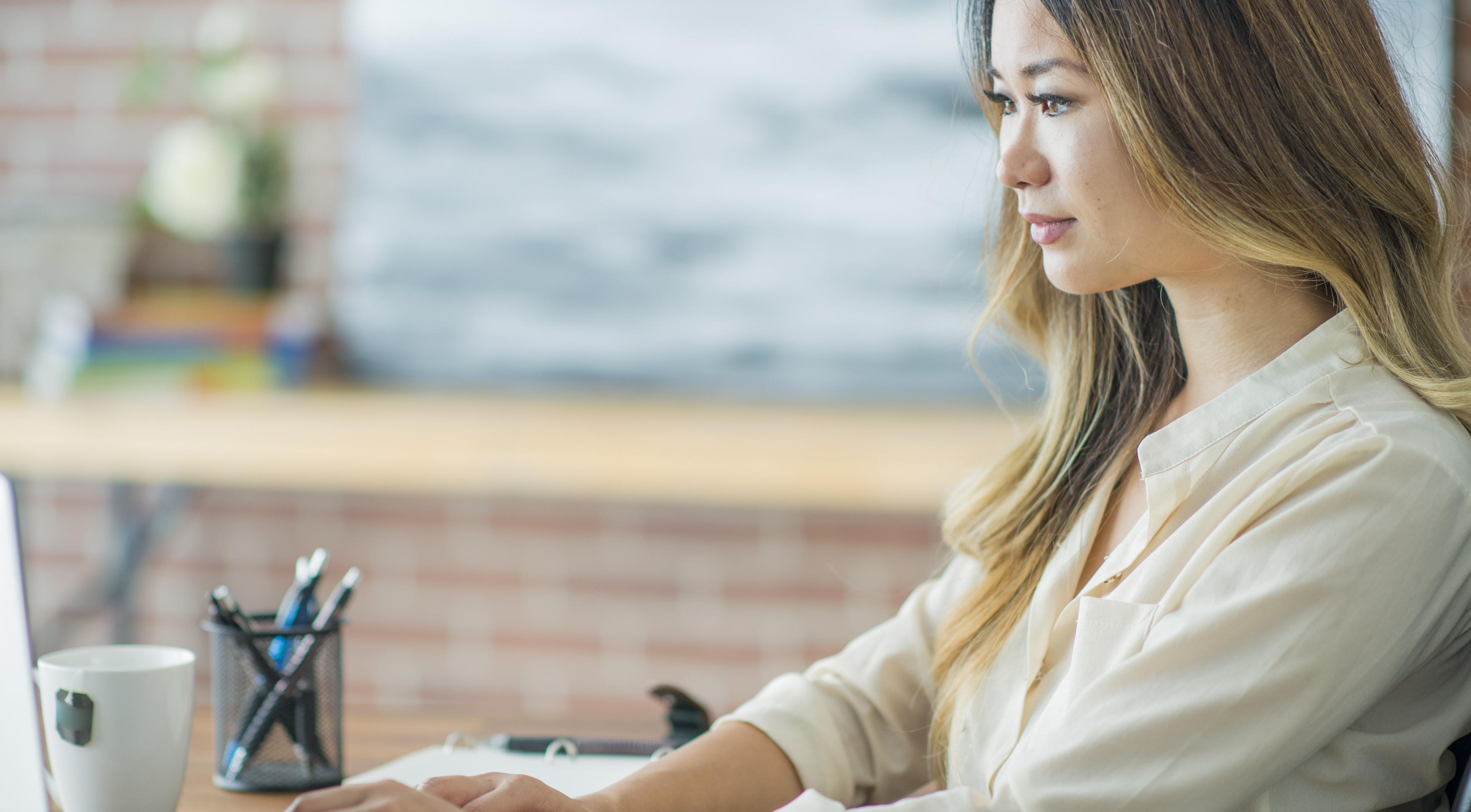 women at desk.