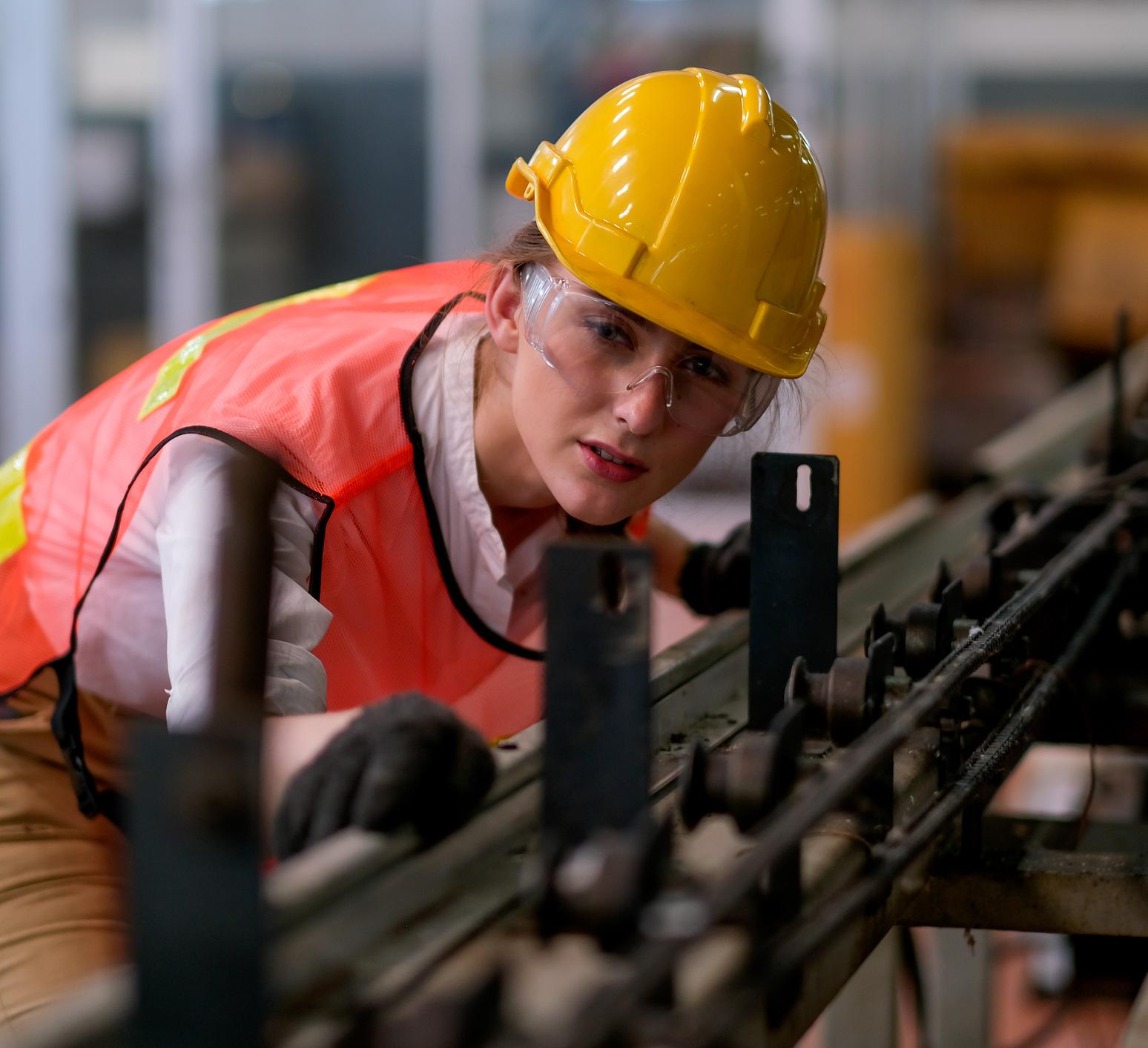 Woman looking at machinery