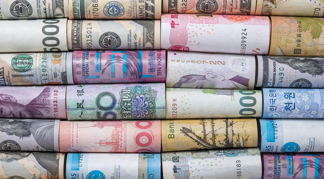 Rolled up currencies from around the world.