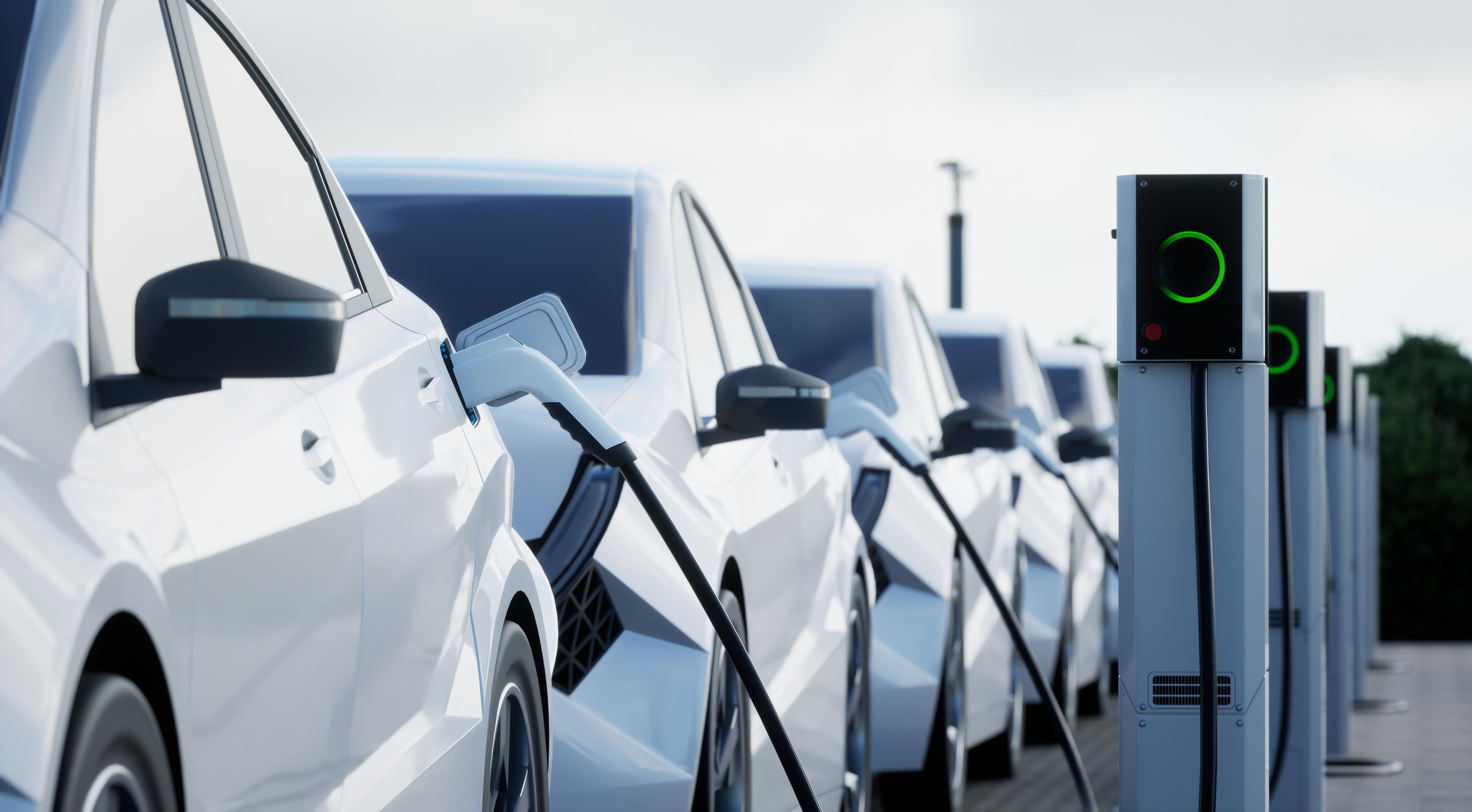 Electric car charging on a city street