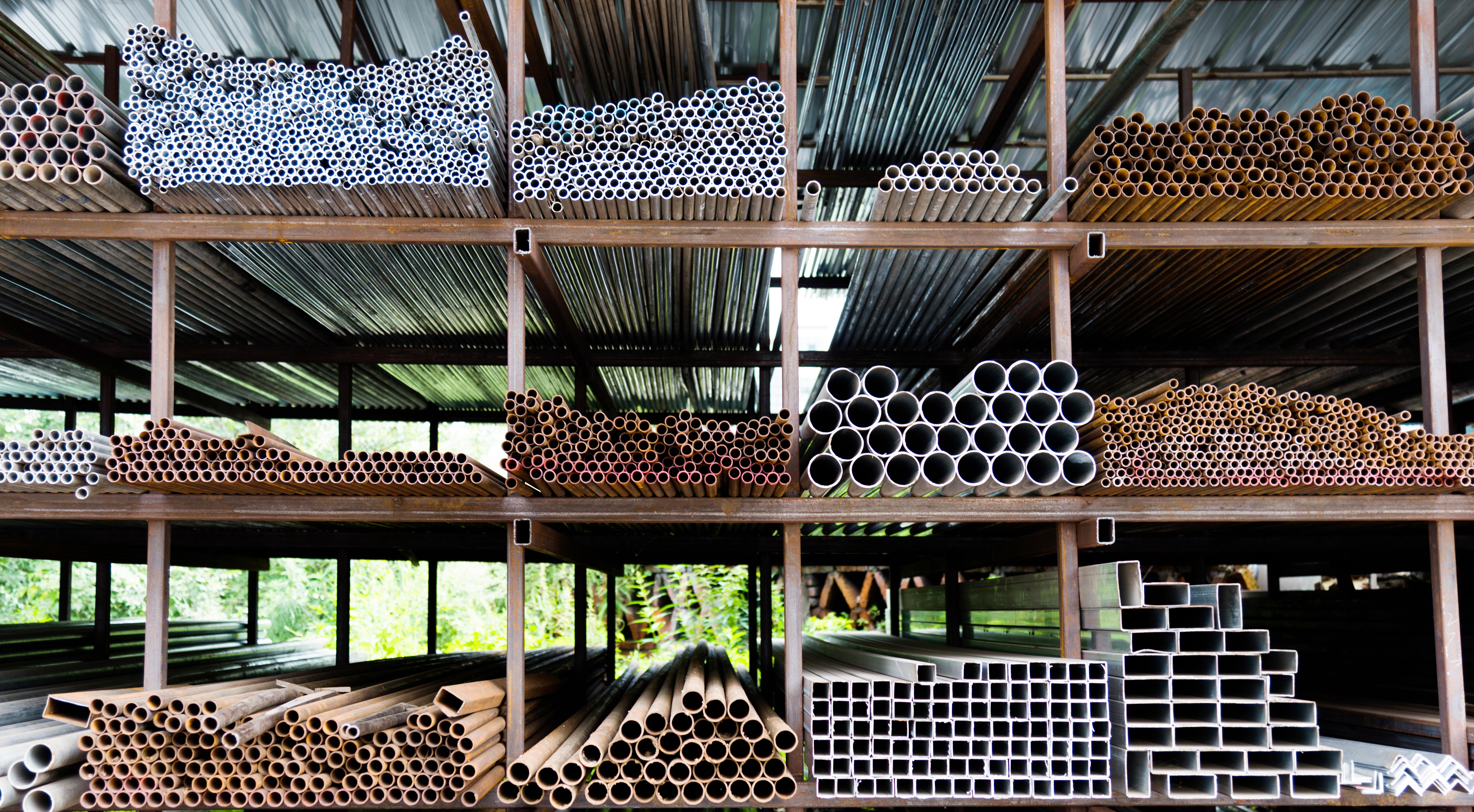 Different sizes of steel tubes on a stock shelf