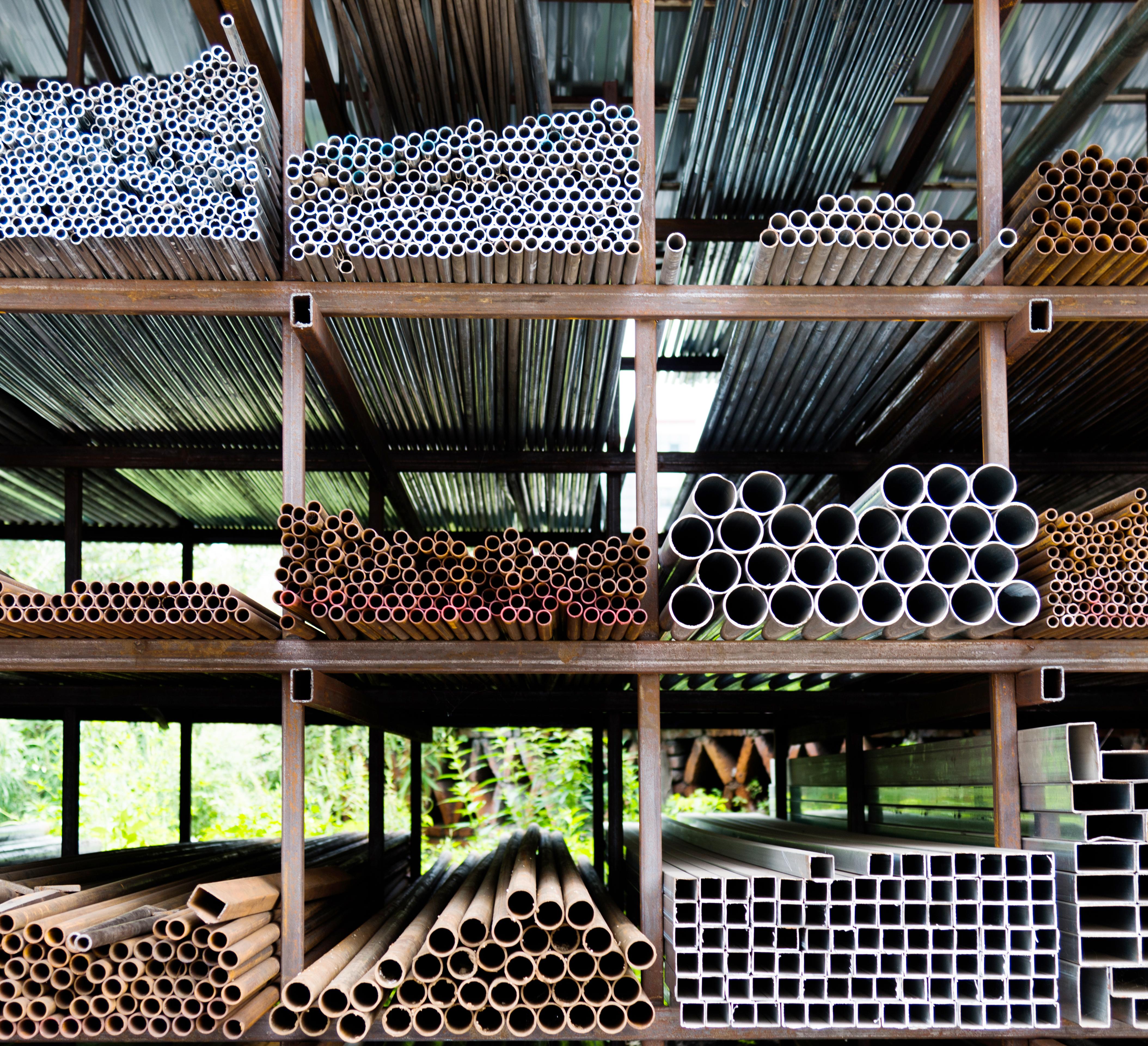 Different sizes of steel tubes on a stock shelf