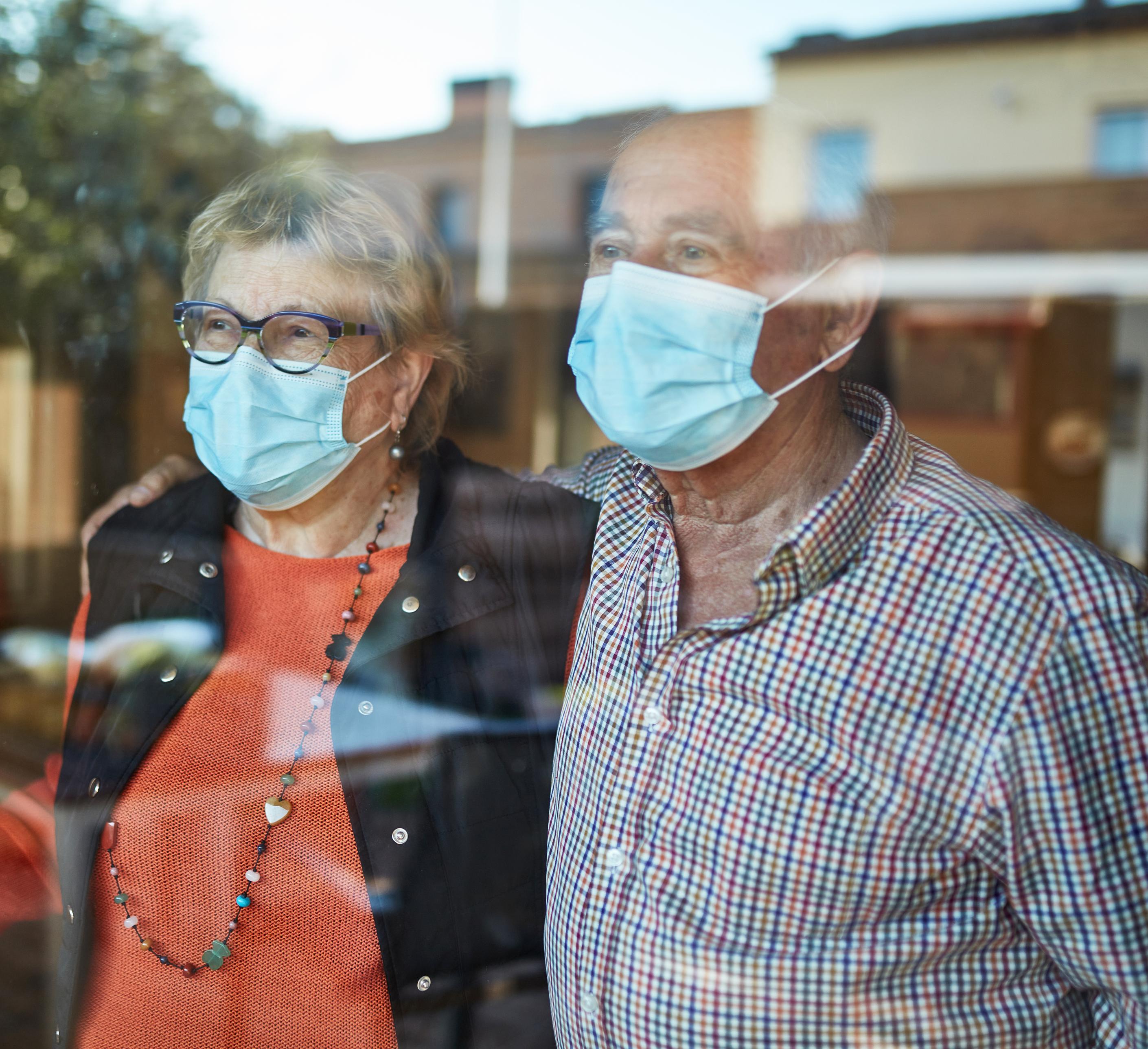 Seniors in an independent living facility wearing masks to protect from COVID-19