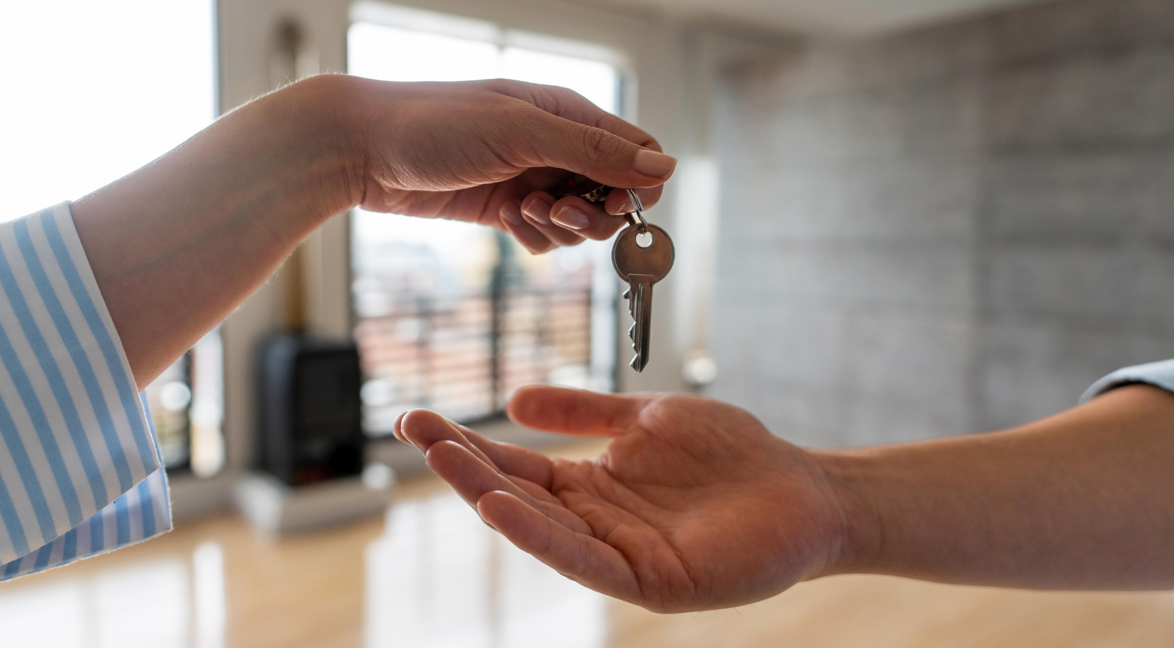 Handing over keys to a house.