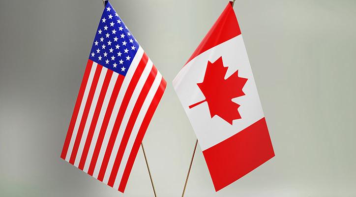 American and Canadian flags.