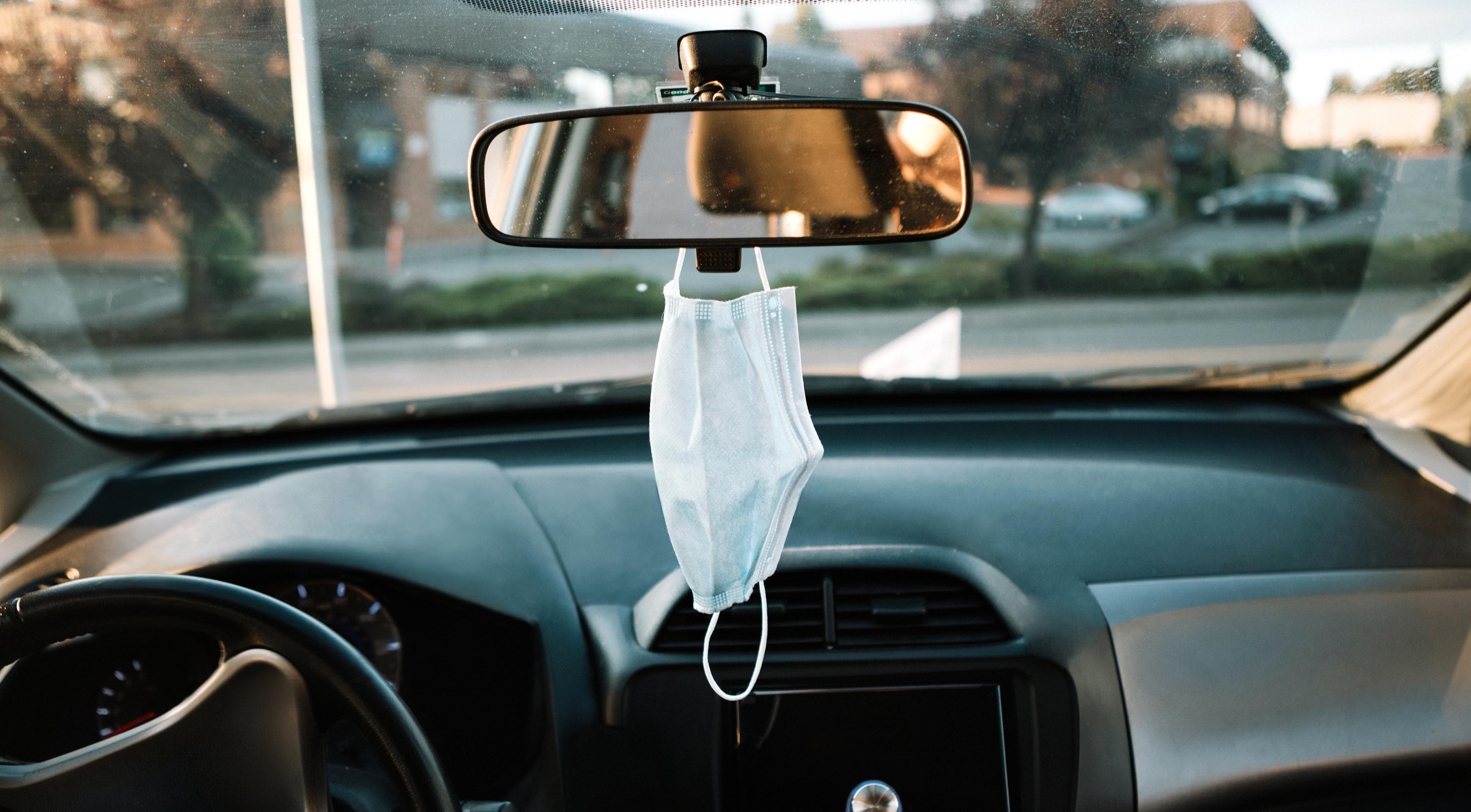face mask on rearview mirror