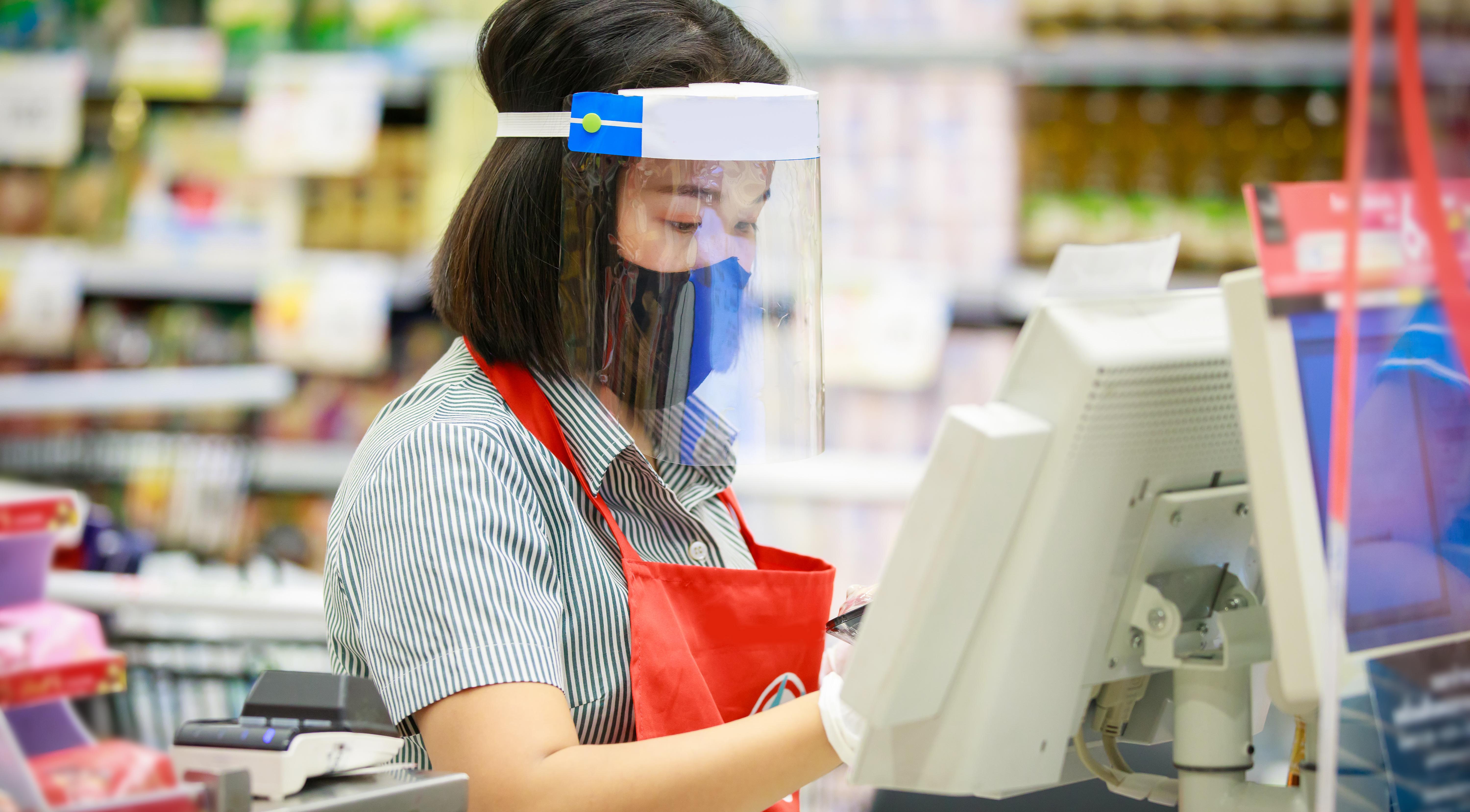 Cashier wearing a face mask