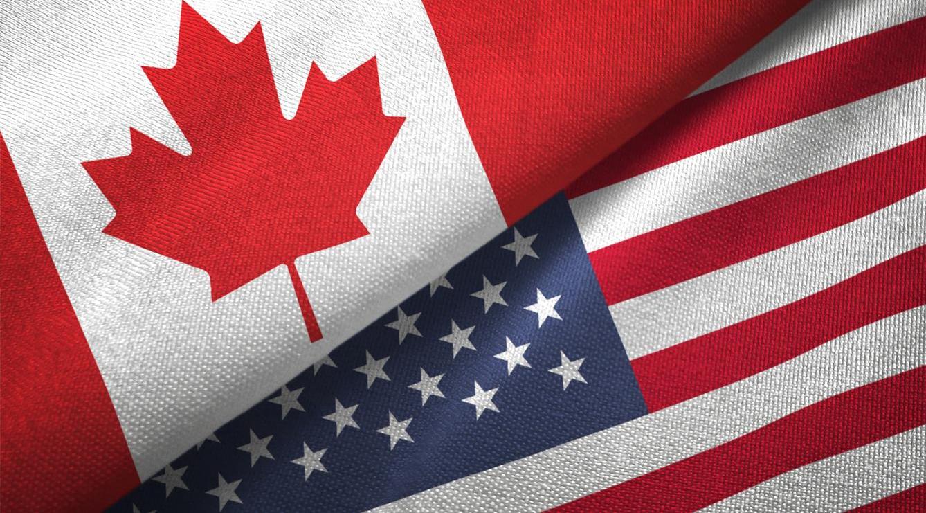 United States and Canada flags.