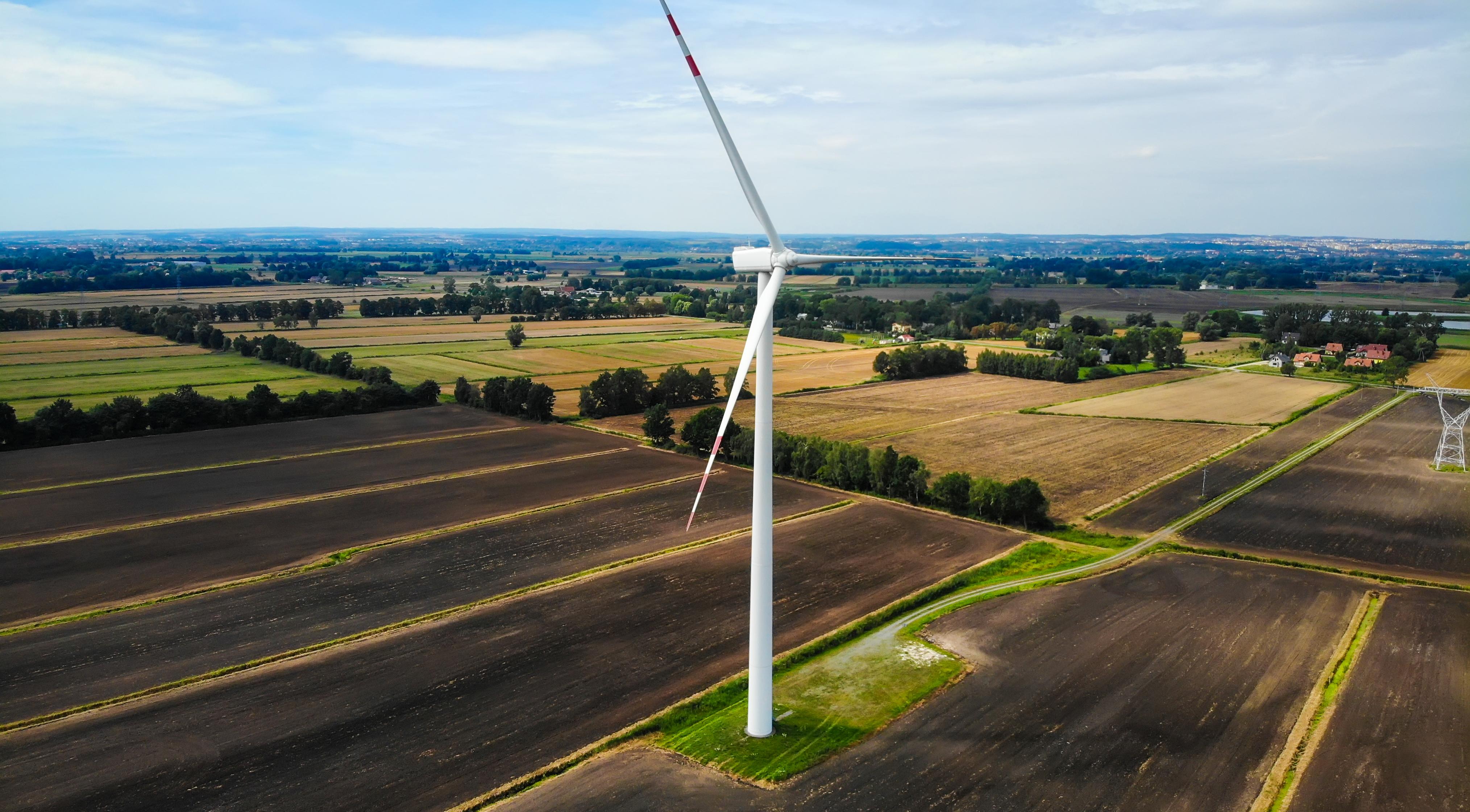 Wind turbine renewable energy aerial view.
