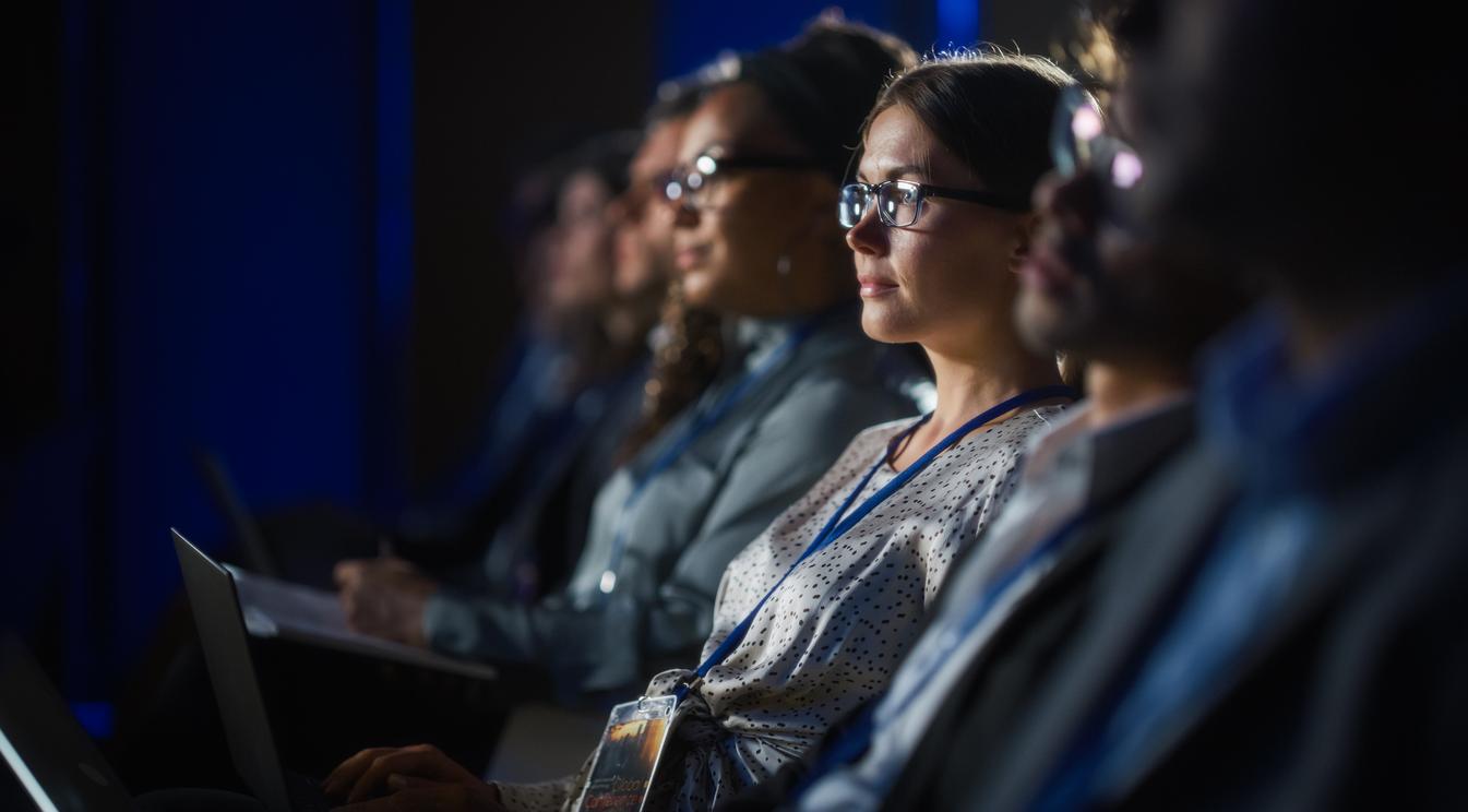 Woman in audience.