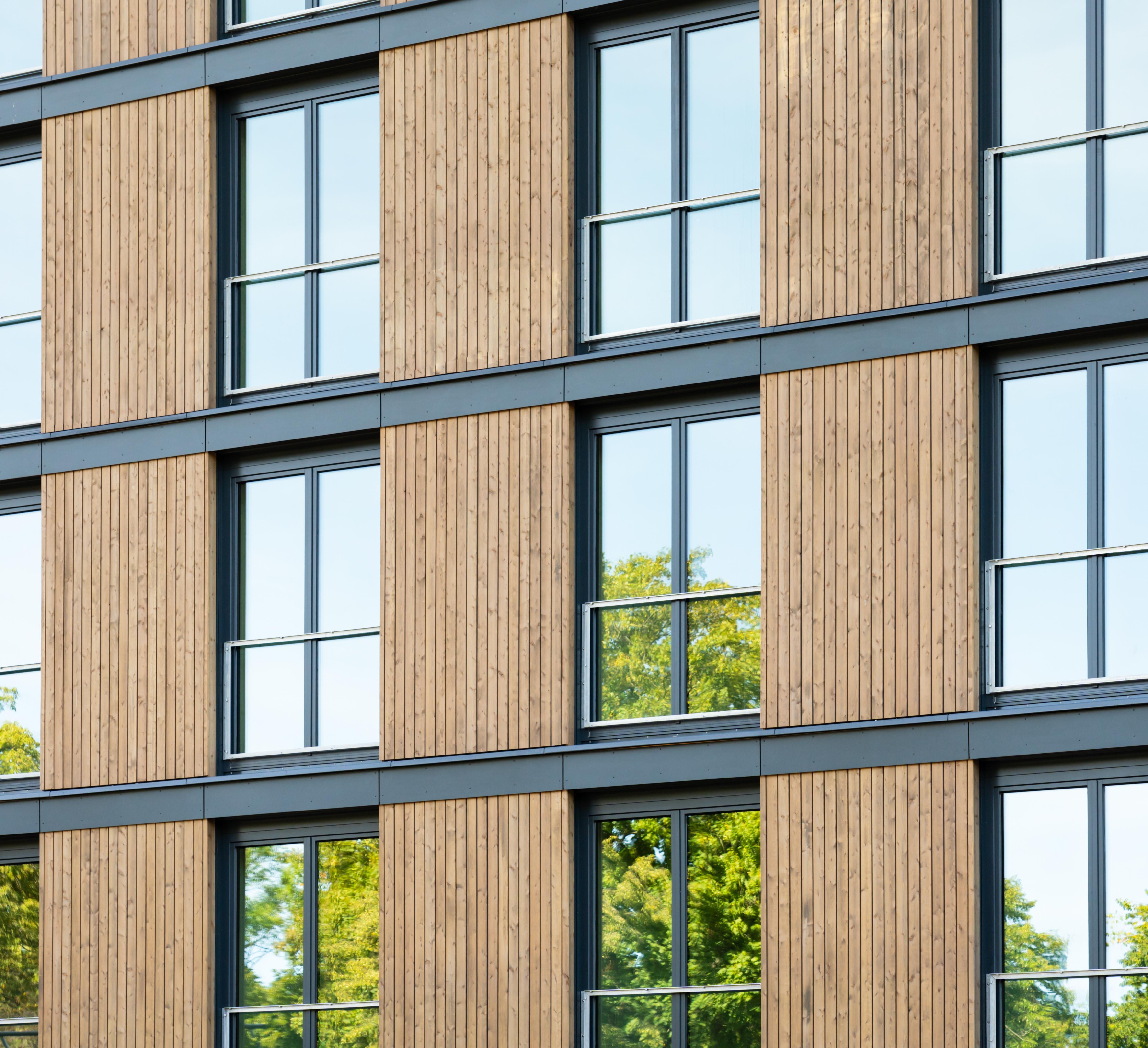 Apartment building with a wood facade